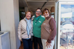 Connecting cultures: Joy alongside attendees during the Punta Expats gathering.