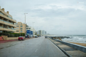 Playa Brava: A residential street in Playa Brava, where houses and apartment buildings share the block, a short walk from the beach.